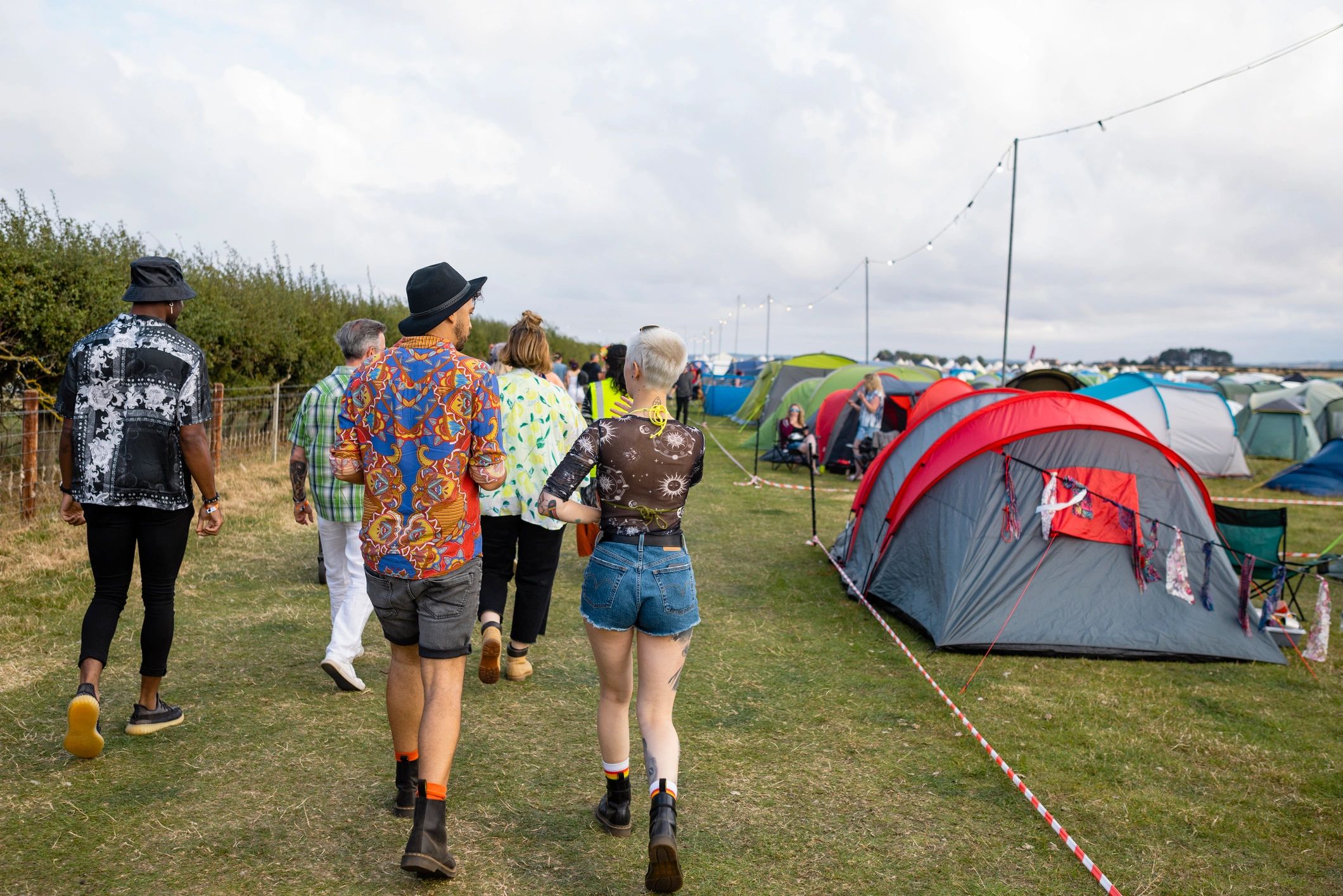 Festival crowd walking toward the event grounds
