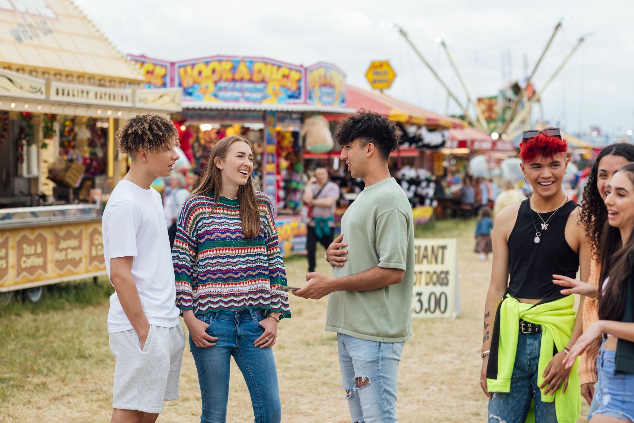 Guests gathering and socializing at an outdoor fair