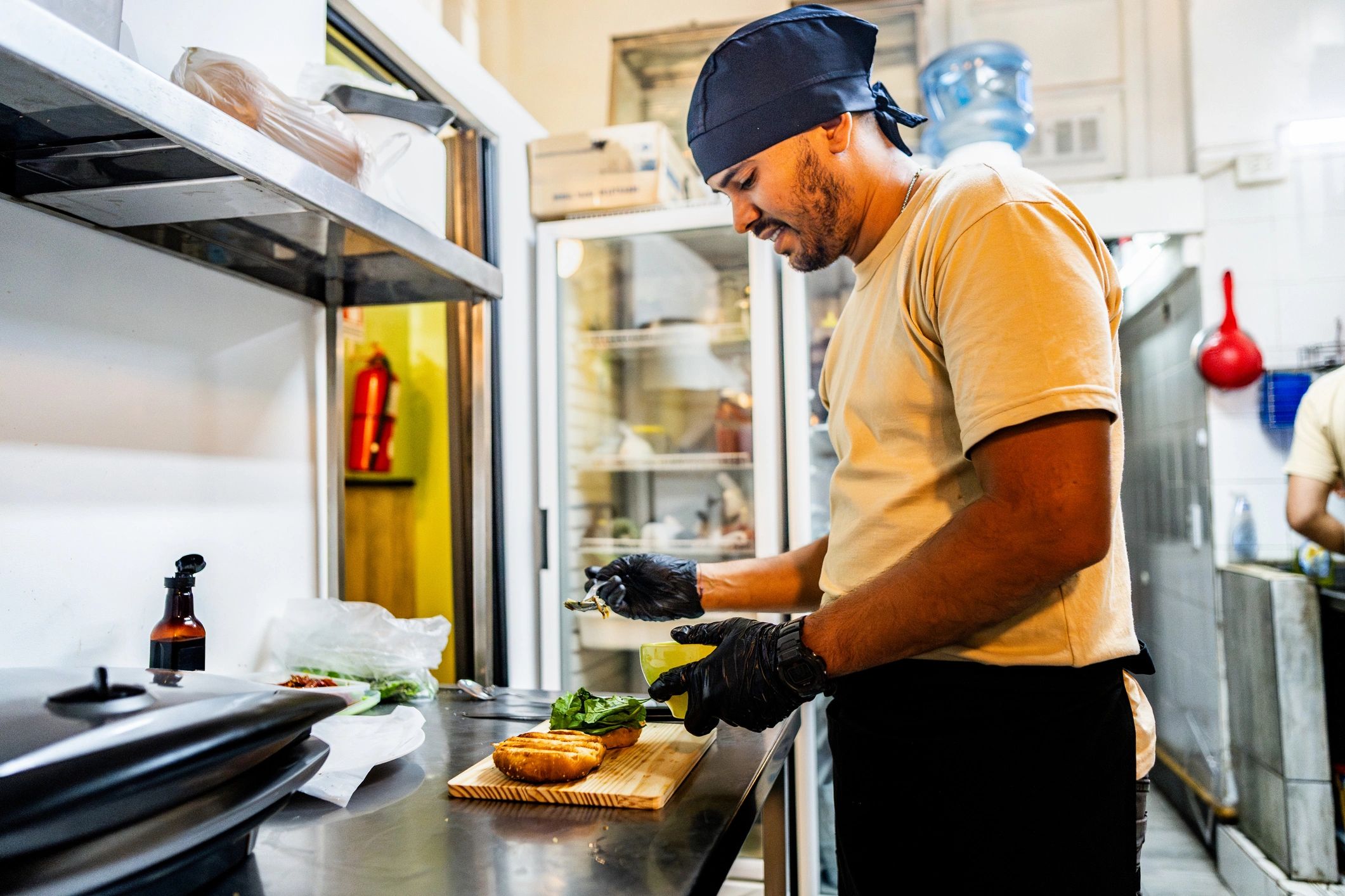 Chef preparing elevated food in a professional kitchen